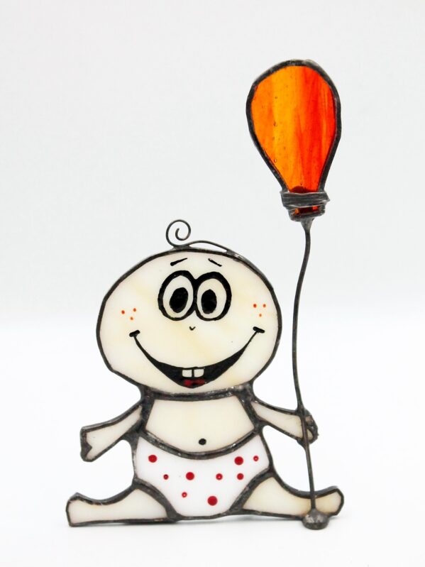Figurka niemowlaka z balonikiem